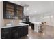 Contemporary kitchen with dark cabinets, stainless steel appliances, and open layout at 3934 Sangre De Cristo Ave, Las Vegas, NV 89118