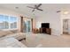Bright carpeted loft with daybed, media center and slider to balcony with natural light at 3934 Sangre De Cristo Ave, Las Vegas, NV 89118