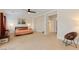 Spacious main bedroom features neutral carpet, decorative lighting, and space for seating at 3934 Sangre De Cristo Ave, Las Vegas, NV 89118