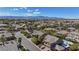 Scenic neighborhood view with lush trees and beautiful landscape against a backdrop of distant mountains at 3934 Sangre De Cristo Ave, Las Vegas, NV 89118