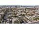 Neighborhood aerial showcasing well-maintained homes, lush palm trees, and community landscaping at 3934 Sangre De Cristo Ave, Las Vegas, NV 89118