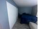 Tranquil bedroom with neutral tones, comfortable furniture, and a large closet at 4030 E Carey Ave, Las Vegas, NV 89115