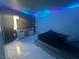 Tile bedroom with LED lighting and dark curtains at 4030 E Carey Ave, Las Vegas, NV 89115