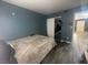 Bedroom featuring wood flooring and closet at 4030 E Carey Ave, Las Vegas, NV 89115