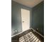 This bedroom features a simple design with a light fixture and electrical outlets at 4030 E Carey Ave, Las Vegas, NV 89115
