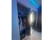 Walk-in closet with double mirrored sliding doors and LED lighting at 4030 E Carey Ave, Las Vegas, NV 89115