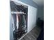 Bedroom closet with sliding doors and ample storage for clothing and shoes at 4030 E Carey Ave, Las Vegas, NV 89115