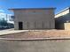 Exterior rear view of apartment building, with view of parking at 4030 E Carey Ave, Las Vegas, NV 89115