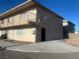 Exterior of the building showing the entrance and parking at 4030 E Carey Ave, Las Vegas, NV 89115