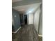 Neutral hallway with white doors and light fixtures at 4030 E Carey Ave, Las Vegas, NV 89115