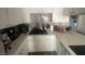 The kitchen features sleek countertops, modern appliances, and ample storage at 4030 E Carey Ave, Las Vegas, NV 89115