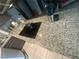 Close up of the modern kitchen with a smooth cooktop and sleek granite countertops at 4030 E Carey Ave, Las Vegas, NV 89115