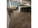This image shows the layout of the kitchen, dining area, and kitchen island at 4030 E Carey Ave, Las Vegas, NV 89115