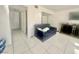 Living room with tiled floors, light walls, and comfortable seating at 4030 E Carey Ave, Las Vegas, NV 89115