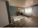The living room area features a view of the entrance door and a white sofa at 4030 E Carey Ave, Las Vegas, NV 89115