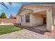 Inviting backyard with low maintenance landscaping and covered patio at 4140 Gliding Gulls Ave, North Las Vegas, NV 89084