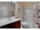 Bathroom featuring single sink vanity and combination shower and tub at 4140 Gliding Gulls Ave, North Las Vegas, NV 89084