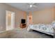 Primary bedroom with carpet floors and ensuite bathroom at 4140 Gliding Gulls Ave, North Las Vegas, NV 89084