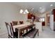 Cozy dining area featuring stylish furniture and a chandelier at 4140 Gliding Gulls Ave, North Las Vegas, NV 89084