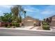 Charming single-story home featuring desert landscaping and a two-car garage at 4140 Gliding Gulls Ave, North Las Vegas, NV 89084