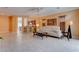 Bright living room with a comfortable sofa and an open floor plan at 4140 Gliding Gulls Ave, North Las Vegas, NV 89084