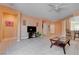 Spacious living room with tile flooring, neutral walls, and ample natural light at 4140 Gliding Gulls Ave, North Las Vegas, NV 89084