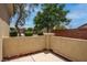 Cozy backyard patio featuring block wall and desert landscaping at 4140 Gliding Gulls Ave, North Las Vegas, NV 89084