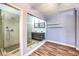 Bathroom featuring a glass shower and a double vanity at 417 Wisteria Ave, Las Vegas, NV 89107