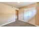 Cozy bedroom featuring plush carpeting, a closet, and neutral walls, perfect for relaxation and rest at 417 Wisteria Ave, Las Vegas, NV 89107