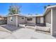 Charming single-story home with a gray exterior, well-kept landscaping, and a welcoming front entrance at 417 Wisteria Ave, Las Vegas, NV 89107