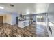 Open-concept living room with wood flooring and plenty of natural light at 417 Wisteria Ave, Las Vegas, NV 89107