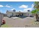 A spacious backyard features a covered patio, perfect for outdoor gatherings and enjoying the peaceful surroundings at 421 Engel Ave, Henderson, NV 89011