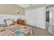 Bedroom featuring a bed, sliding closet doors and a neutral color scheme at 421 Engel Ave, Henderson, NV 89011