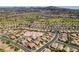 Community aerial view showcasing homes, golf course and the mountains at 435 Piute Valley Ct, Henderson, NV 89012