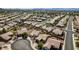 Panoramic aerial view of residential area showing street layout, surrounding homes, and the area mountains in the distance at 435 Piute Valley Ct, Henderson, NV 89012