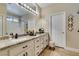 Bathroom featuring a long vanity with dual sinks and modern fixtures at 435 Piute Valley Ct, Henderson, NV 89012