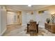 Bright dining room with wood floors and an open layout to the entry at 435 Piute Valley Ct, Henderson, NV 89012