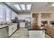 Bright kitchen with granite countertops, stainless appliances, and a butcher block island, adjacent to the living room at 435 Piute Valley Ct, Henderson, NV 89012