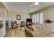 Inviting living room with a cozy fireplace and comfortable seating arrangement at 435 Piute Valley Ct, Henderson, NV 89012