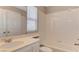 Bathroom features a tub, shower, toilet and single sink at 4411 Wild Honey Ct, Las Vegas, NV 89147