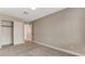 Bedroom featuring neutral paint, closet, and plush grey carpet at 4411 Wild Honey Ct, Las Vegas, NV 89147