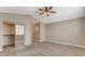 Bedroom featuring vaulted ceiling, neutral walls, carpet floors, and a closet with mirrored doors at 4411 Wild Honey Ct, Las Vegas, NV 89147