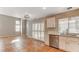 Bright kitchen featuring stainless appliances, tile floors, and sliding door access to the outside at 4411 Wild Honey Ct, Las Vegas, NV 89147