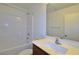 Bathroom with a shower over tub, a white sink, and a large mirror at 4905 Quiet Morning St, Las Vegas, NV 89122