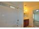 Bathroom with tile flooring, shower with hand-held wand, and a wood vanity at 4905 Quiet Morning St, Las Vegas, NV 89122