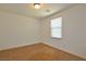 A bright bedroom with neutral tones, a window with blinds, and carpeted floors provides a cozy atmosphere at 4905 Quiet Morning St, Las Vegas, NV 89122