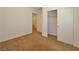 Bedroom featuring carpet, neutral walls, and a closet with sliding doors at 4905 Quiet Morning St, Las Vegas, NV 89122