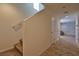 Entryway with stairs, neutral walls, and tile leading to the main living area at 4905 Quiet Morning St, Las Vegas, NV 89122