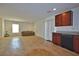 Spacious living room with lots of light, beige tile floor, and a comfortable beige sofa at 4905 Quiet Morning St, Las Vegas, NV 89122