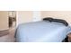 Cozy bedroom with carpet floors and views through to the dining area at 5521 Moss Landing St, North Las Vegas, NV 89031
